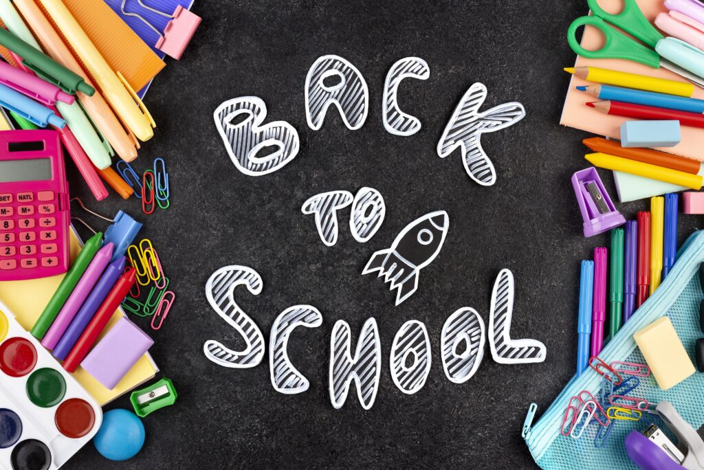 back-school-background-with-school-supplies-chalkboard-1024x684.jpg